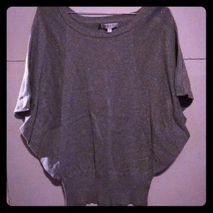 Jennifer Lopez batwing glitter shirt
